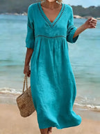 Nina | Vestido Feminino Decote V Manga Curta com Bolsos