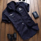Greta | Camisa Masculina Manga Curta Bolsos Cargo