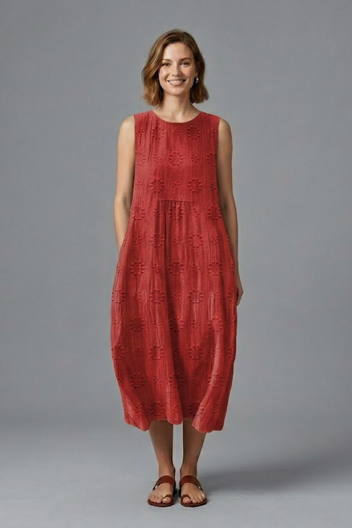 Vestido midi feminino gola redonda sem mangas com superfície texturizada e bolsos laterais