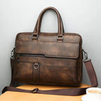 Bolsa de ombro em couro masculina com alça ajustável e fecho de correr